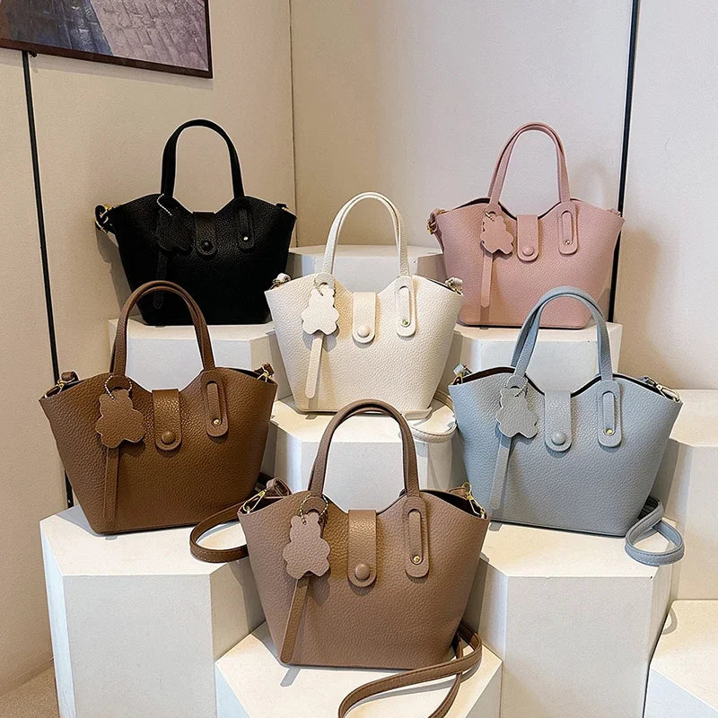 2024 New Simple Texture Lychee Pattern Hand-held Wing Bag Crossbody Bucket Handbag for Temperament Bucket Crossbody Bag